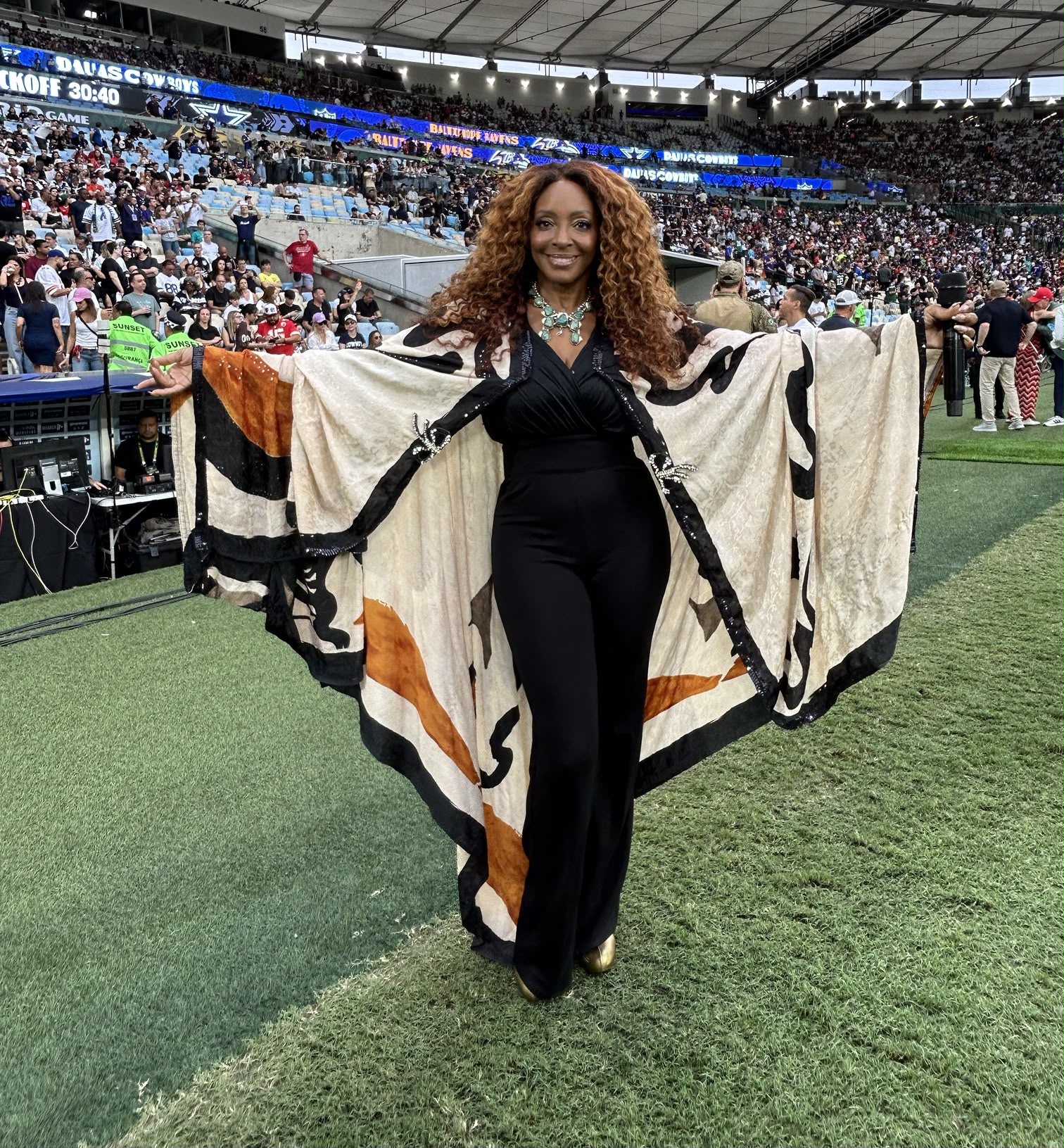 Kandace Lindsey on the field at Maracanã Stadium ahead of the Dallas Cowboys vs. Baltimore Ravens NFL kickoff, Rio de Janeiro